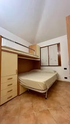 Letto o letti in una camera di Villa Luca