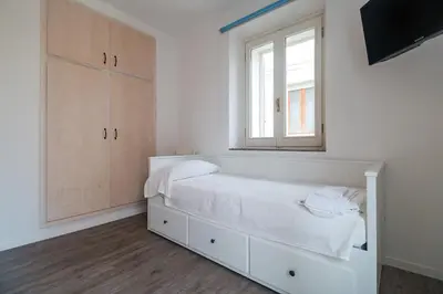 Letto o letti in una camera di Locanda Su Recreu