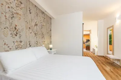 Letto o letti in una camera di Hotel Donatella