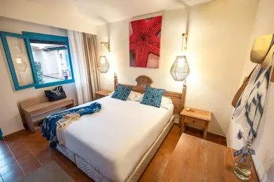 Letto o letti in una camera di MClub Budoni