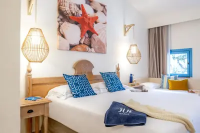 Letto o letti in una camera di MClub Budoni