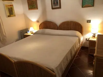 Letto o letti in una camera di residenza Gli Asparagi