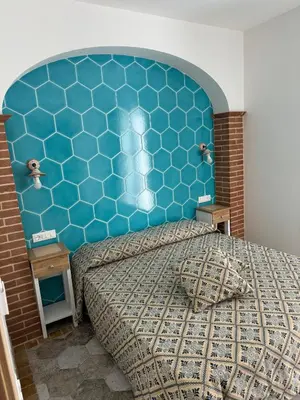 Letto o letti in una camera di Casa Gallo