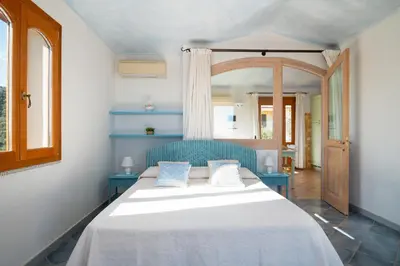 Letto o letti in una camera di Solaria - Villa Ludduì