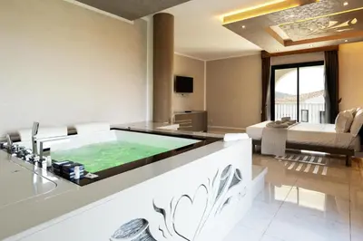TV o dispositivi per l'intrattenimento presso Green Residence Olbia