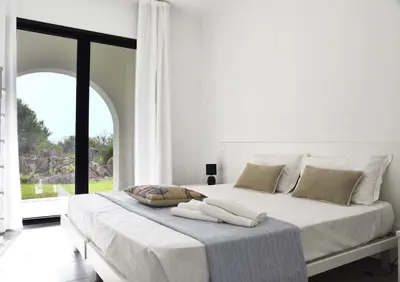 Letto o letti in una camera di Green Residence Olbia