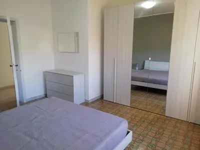Letto o letti in una camera di Villa San Gavino