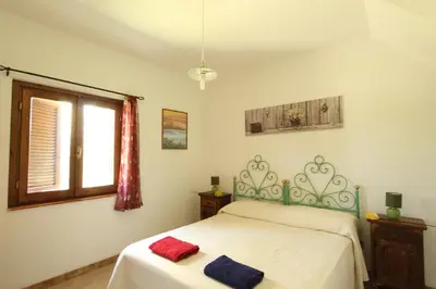 Letto o letti in una camera di Villette Oasi