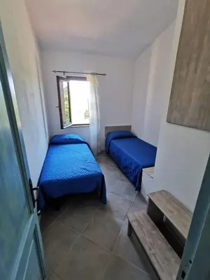 Letto o letti in una camera di Villette Oasi