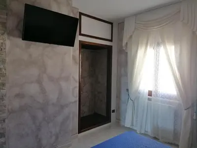 TV o dispositivi per l'intrattenimento presso Sardinia B&B house