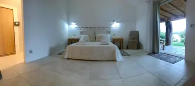 Letto o letti in una camera di Pedra Smeralda