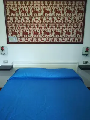 Letto o letti in una camera di Visit San Teodoro