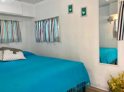 Letto o letti in una camera di Camping Car Palmasera