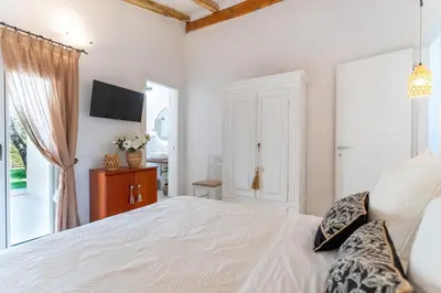 Letto o letti in una camera di Villa Smeralda
