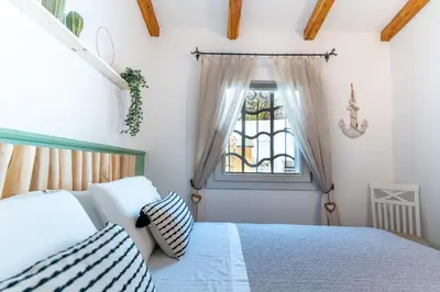 Letto o letti in una camera di Villa Smeralda
