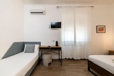 Letto o letti in una camera di NG Guest House l'Acquedotto