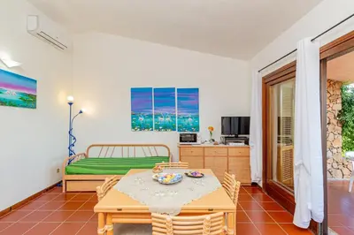 TV o dispositivi per l'intrattenimento presso Appartamento Cala Paradiso