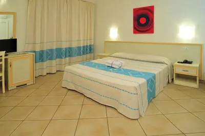 Letto o letti in una camera di Hotel Stella Marina