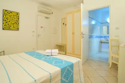 Letto o letti in una camera di Hotel Stella Marina