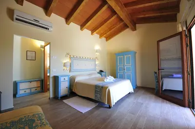 Letto o letti in una camera di Hotel L'Esagono