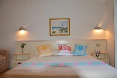 Letto o letti in una camera di Hotel La Palma