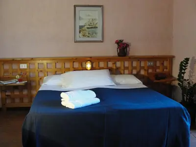 Letto o letti in una camera di Hotel Scintilla