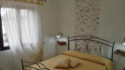 Letto o letti in una camera di Appartamenti Sardegna