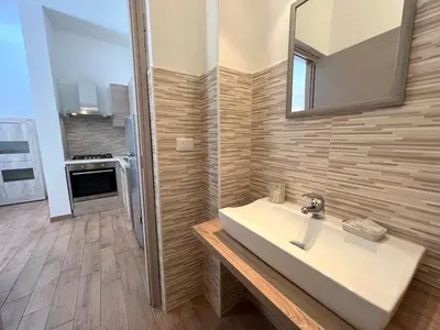 Cucina o angolo cottura di Olbia Domus Inn