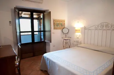 Letto o letti in una camera di Turismo Rurale Belvedere Pradonos