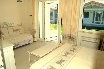 Letto o letti in una camera di Hotel Budoni Beach