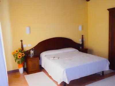 Letto o letti in una camera di Tenuta Su Vrau