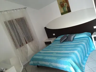 Letto o letti in una camera di Residence Olbia