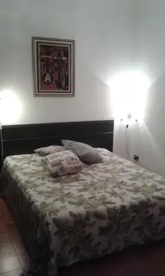 Letto o letti in una camera di Casa Mimmi