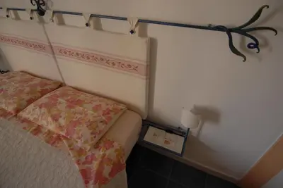 Letto o letti in una camera di Nughe 'e' Oro Guesthouse