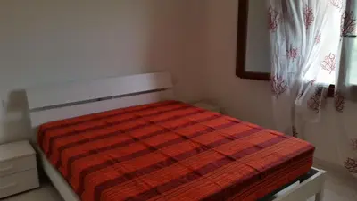 Letto o letti in una camera di Casa Carla