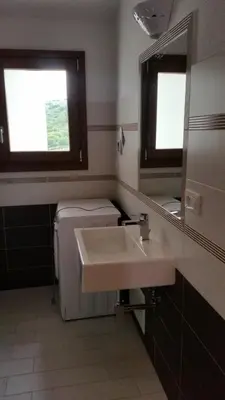 Letto o letti in una camera di Casa Carla