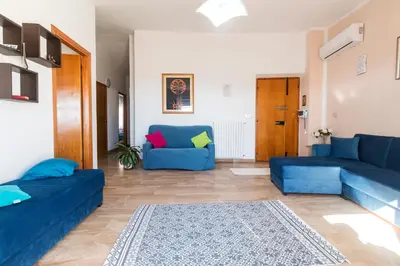 Area soggiorno di White Rose Suite Apartment