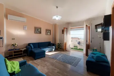 Area soggiorno di White Rose Suite Apartment