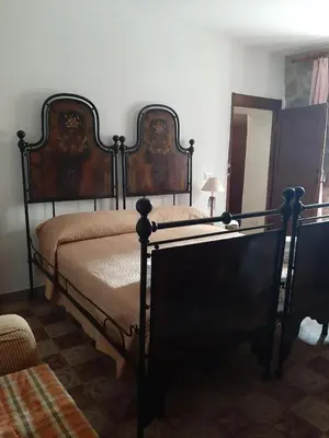 Letto o letti in una camera di B&B L'amaca della felicità
