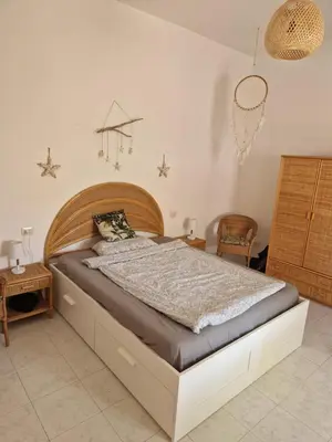 Letto o letti in una camera di Casa Aresula