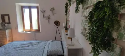 Letto o letti in una camera di Casa Aresula
