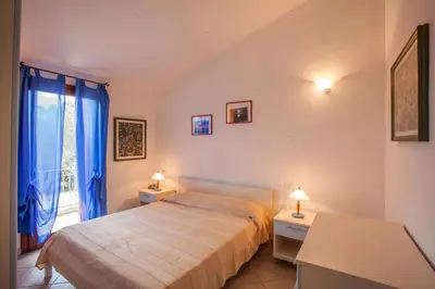 Letto o letti in una camera di Maestrale Flat - Klodge