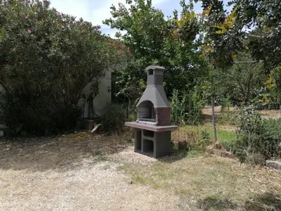 Giardino di Casa indipendente immersa nel verde con vista mare