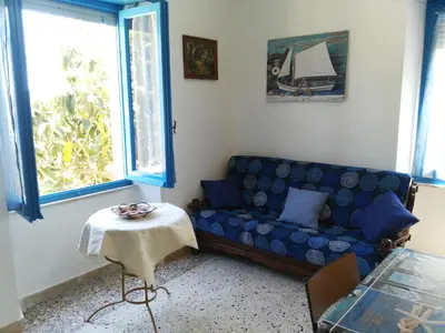 Area soggiorno di Casa indipendente immersa nel verde con vista mare