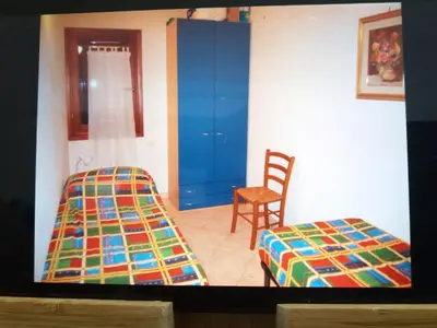 Letto o letti in una camera di san teodoro