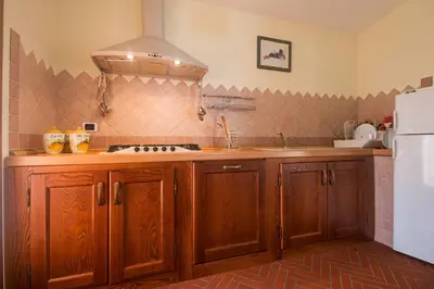 Cucina o angolo cottura di Villa Corrasi Oliena Luxury