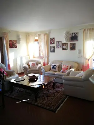 Area soggiorno di Villa Corrasi Oliena Luxury
