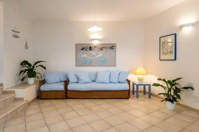 Area soggiorno di Apartment in S'Abba e Sa Pedra complex with pool
