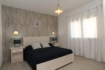 Letto o letti in una camera di Residence SardegnaSummer Li Mori