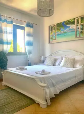 Letto o letti in una camera di Le Caterine 2